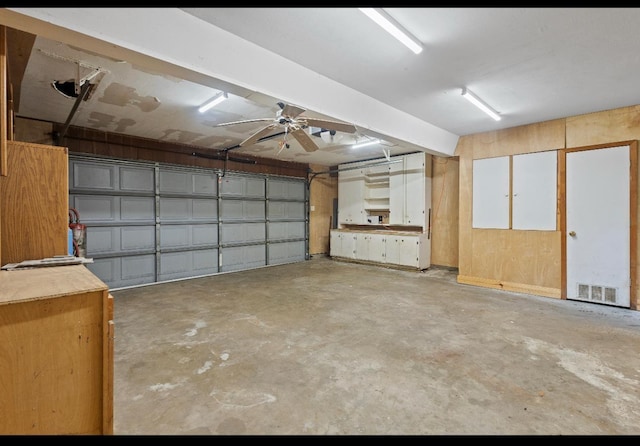 3042 Parish Cemetery Rd, Little Cypress, TX 77632 - garage with a ceiling fan