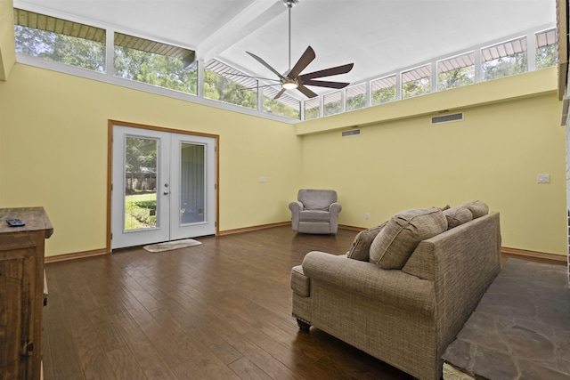 3042 Parish Cemetery Rd, Little Cypress, TX 77632 - living room with beam ceiling, a ceiling fan, dark wood-type flooring, french doors, and high vaulted ceiling