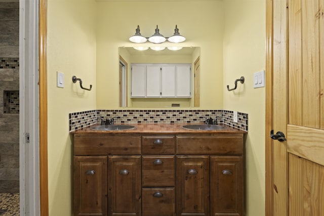 3042 Parish Cemetery Rd, Little Cypress, TX 77632 - full bathroom with tasteful backsplash and double vanity