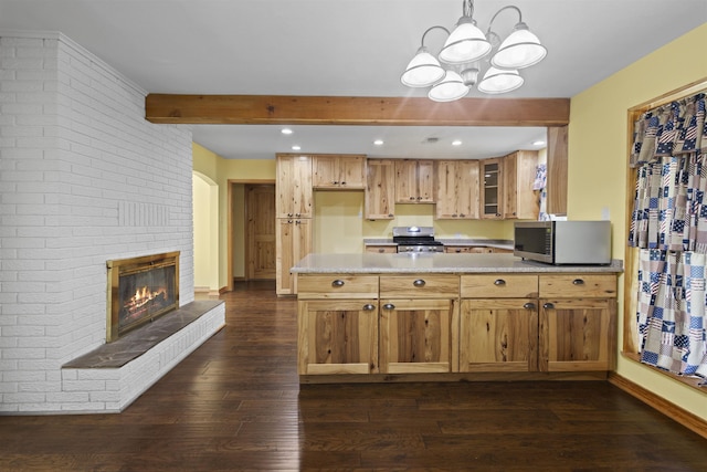 3042 Parish Cemetery Rd, Little Cypress, TX 77632 - kitchen with appliances with stainless steel finishes, dark wood-type flooring, a peninsula, a chandelier, and beam ceiling