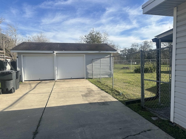 garage featuring a yard