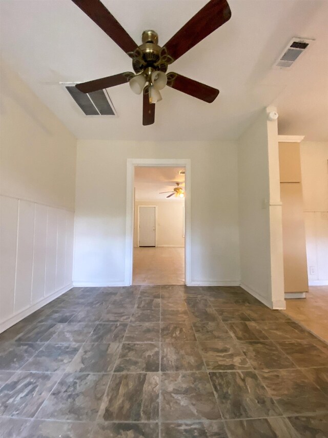 unfurnished room featuring ceiling fan