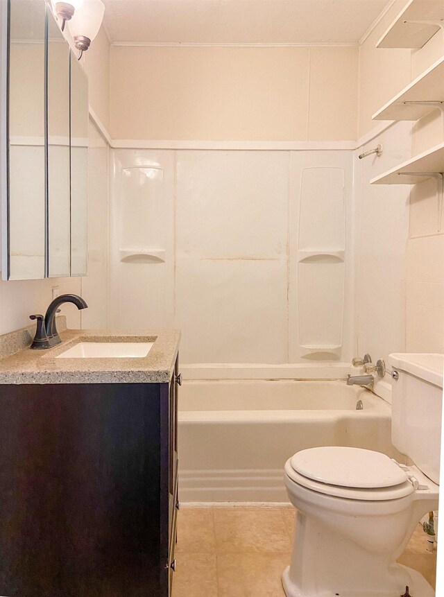 full bathroom featuring tile patterned floors, vanity, bathtub / shower combination, and toilet