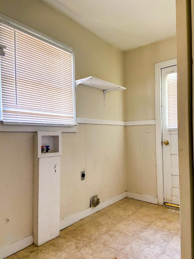 clothes washing area featuring washer hookup and hookup for an electric dryer