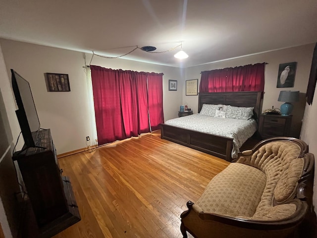 bedroom featuring hardwood / wood-style flooring