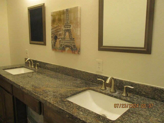 4375 Oak Dr, Vidor, TX 77662 - bathroom featuring double vanity