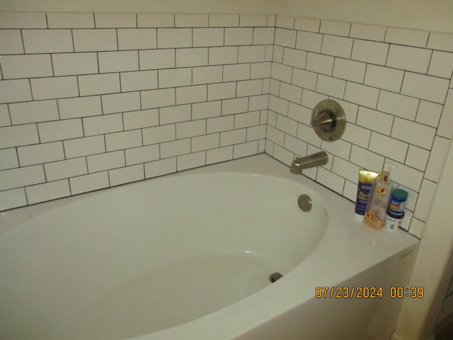 bathroom featuring a bath