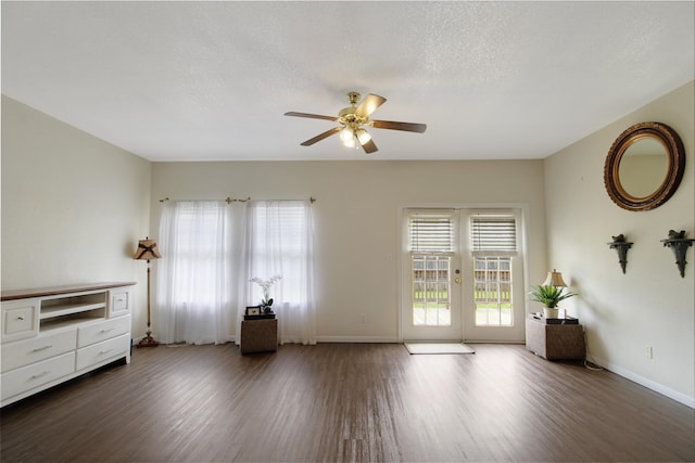 465 Lytton Dr, Vidor, TX 77662 - living room with a ceiling fan, wood finished floors, french doors, and a textured ceiling