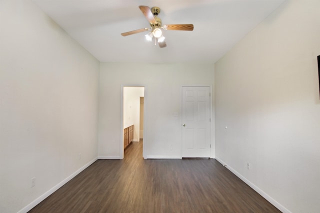 465 Lytton Dr, Vidor, TX 77662 - unfurnished bedroom with dark wood finished floors and ceiling fan
