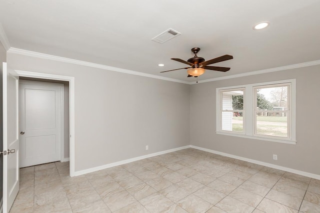 unfurnished room featuring visible vents, baseboards, and crown molding