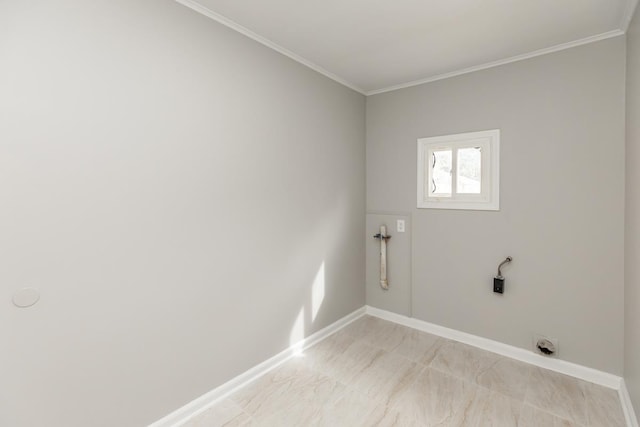 laundry room featuring laundry area, baseboards, and ornamental molding