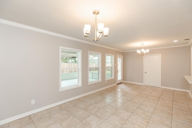 spare room with ornamental molding, baseboards, and a chandelier