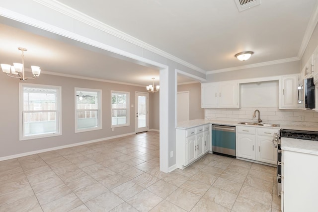 kitchen with visible vents, an inviting chandelier, plenty of natural light, stainless steel appliances, and a sink