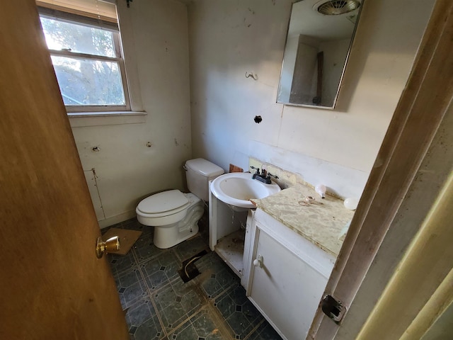 bathroom with toilet and sink