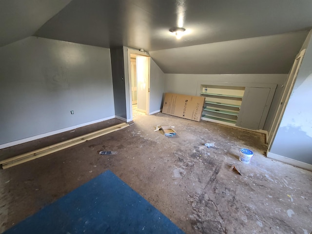 bonus room featuring vaulted ceiling