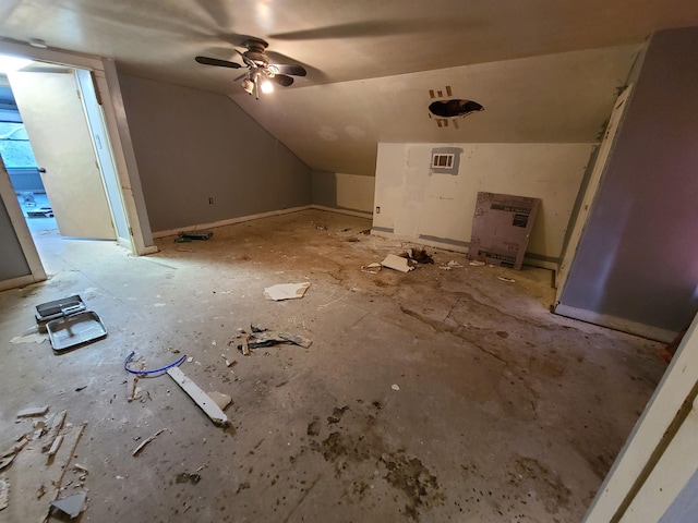 additional living space with vaulted ceiling and ceiling fan