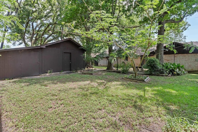 470 Junker Rd, Beaumont, TX 77707 - view of green lawn featuring an outdoor structure