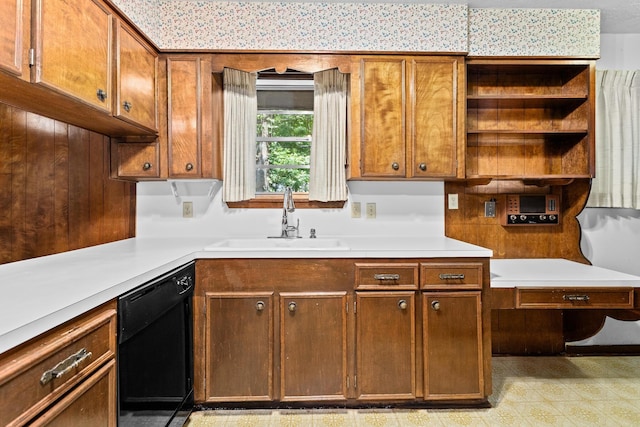 470 Junker Rd, Beaumont, TX 77707 - kitchen featuring black dishwasher, a sink, open shelves, and light countertops