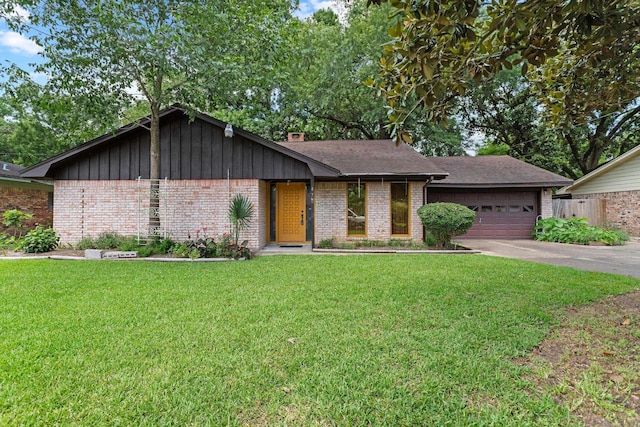 470 Junker Rd, Beaumont, TX 77707 - mid-century inspired home featuring brick siding, concrete driveway, a garage, and roof with shingles