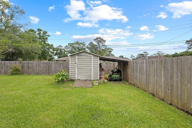 2040 Chevy Chase Ln, Beaumont, TX 77706 - view of yard featuring a storage shed and an outdoor structure