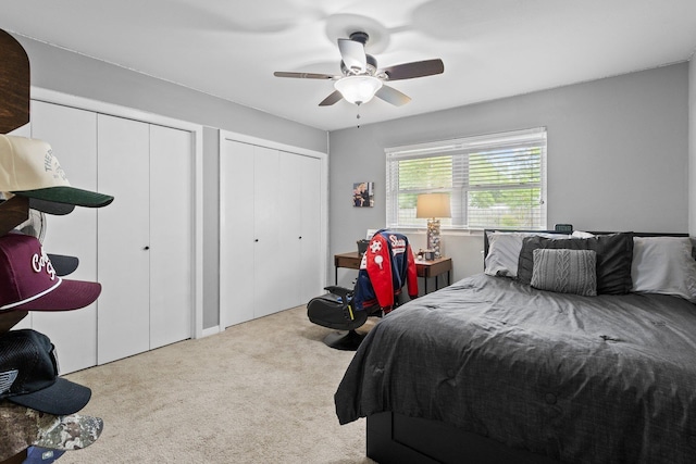 2040 Chevy Chase Ln, Beaumont, TX 77706 - bedroom featuring two closets, carpet flooring, and ceiling fan
