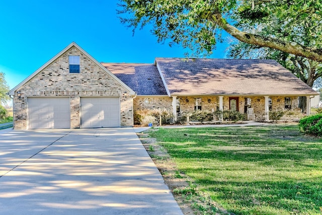 view of front of property with a front yard and brick siding