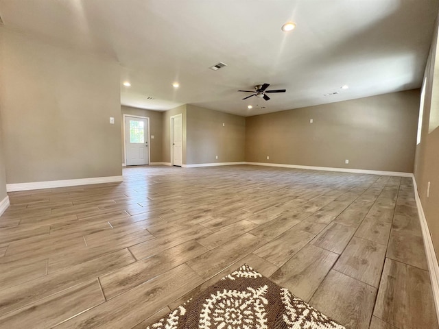 unfurnished room featuring ceiling fan