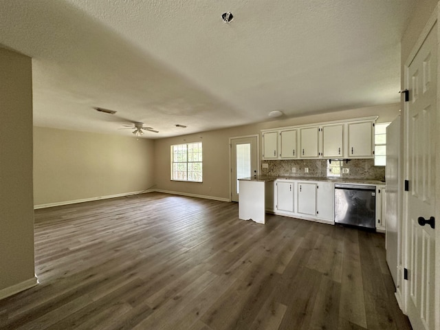 kitchen with dishwasher, backsplash, white cabinets, ceiling fan, and dark hardwood / wood-style flooring