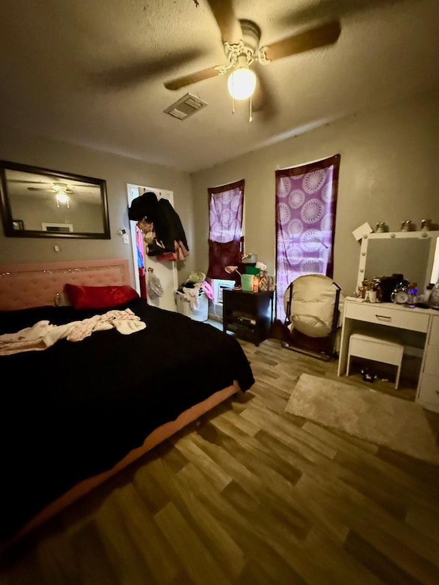 3656 Hemlock St, Orange, TX 77630 - bedroom with wood finished floors and a ceiling fan