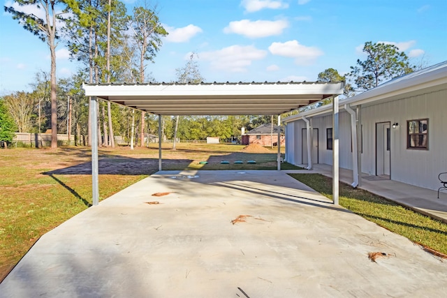 view of patio / terrace with a carport