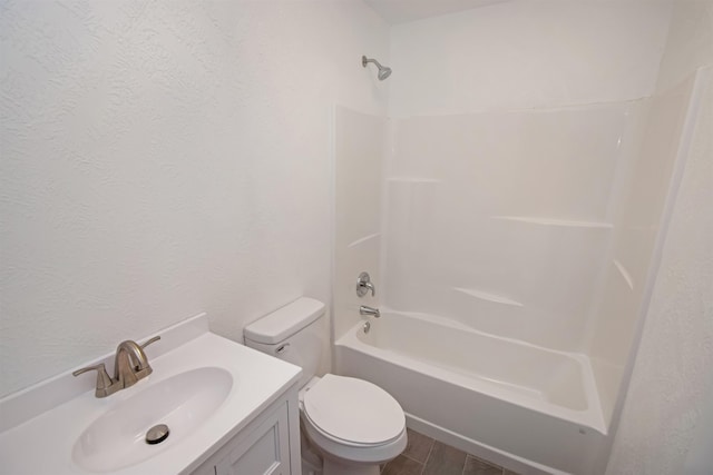 full bathroom featuring vanity, toilet, and shower / bathtub combination