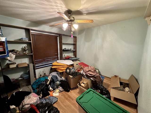 miscellaneous room featuring hardwood / wood-style floors and ceiling fan