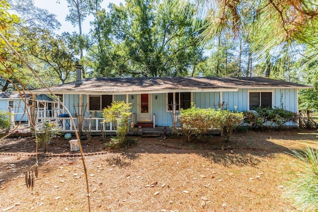 ranch-style home with covered porch