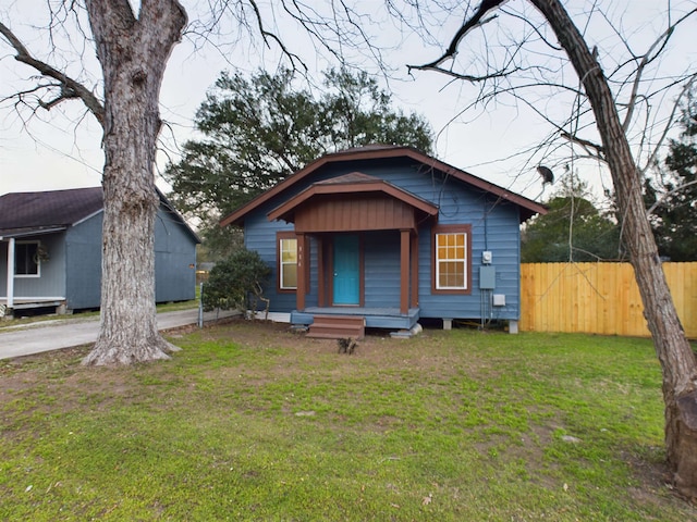 bungalow with a front lawn