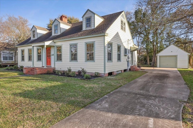 new england style home featuring entry steps, a garage, an outdoor structure, driveway, and a front yard