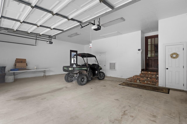 27076 Interstate 10, Winnie, TX 77665 - garage featuring a garage door opener