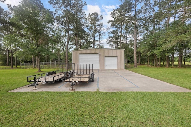 27076 Interstate 10, Winnie, TX 77665 - detached garage with view of scattered trees