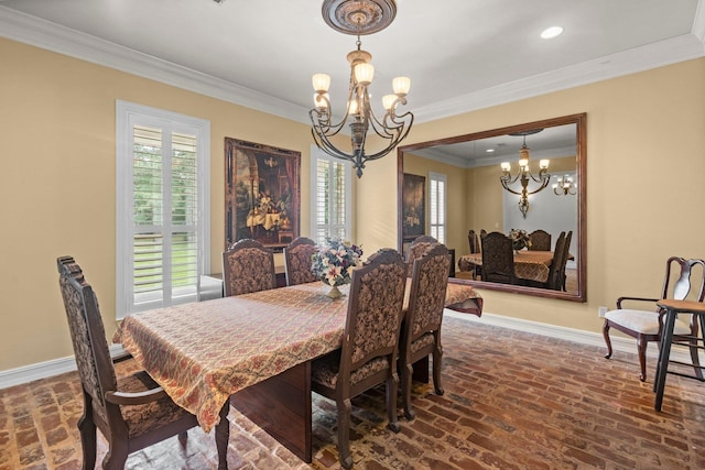 27076 Interstate 10, Winnie, TX 77665 - dining room with a chandelier, baseboards, crown molding, brick flooring, and recessed lighting