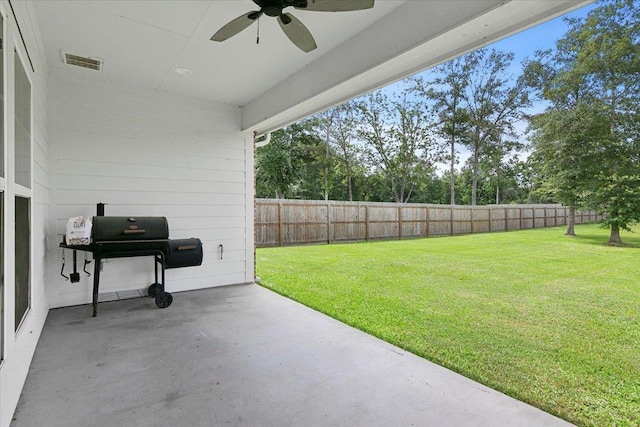 view of patio / terrace featuring area for grilling, a ceiling fan, visible vents, and a fenced backyard