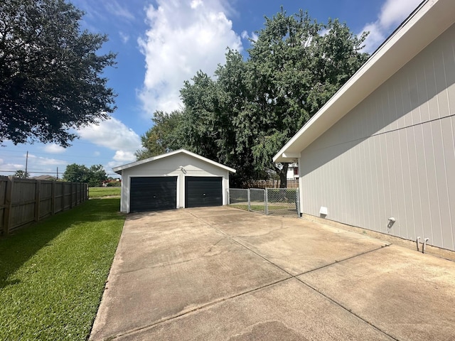 garage featuring a yard