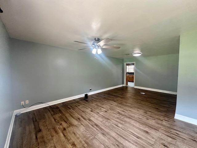 additional living space with hardwood / wood-style flooring and ceiling fan