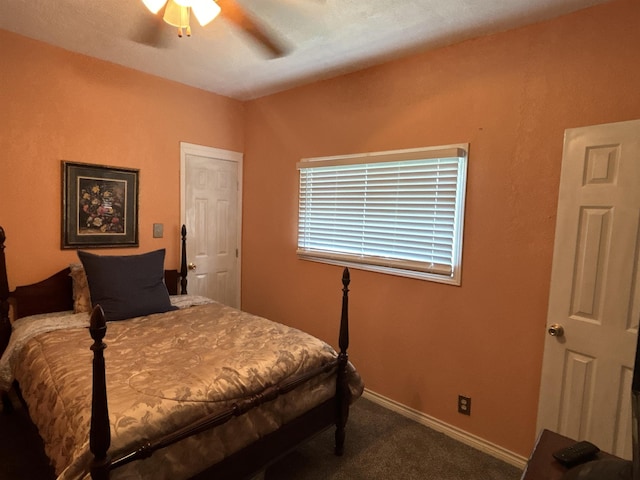 carpeted bedroom with ceiling fan