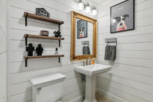 bathroom featuring sink and toilet