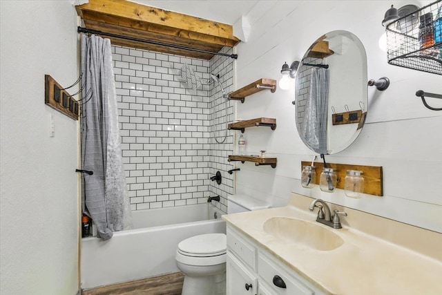 full bathroom featuring vanity, wood-type flooring, shower / tub combo, and toilet