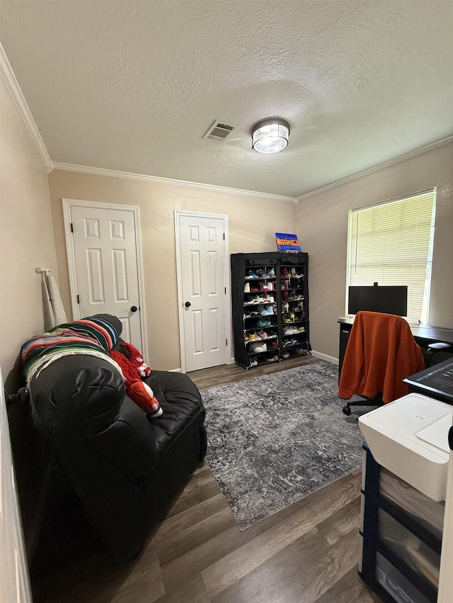 9325 Bamboo Ln, Beaumont, TX 77708 - office area with crown molding, wood finished floors, and a textured ceiling