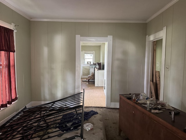 1598 Euclid St, Beaumont, TX 77705 - hall featuring crown molding, wood finished floors, and a decorative wall