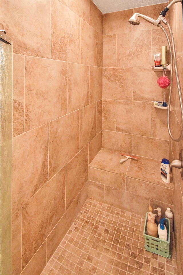 interior space with a tile shower