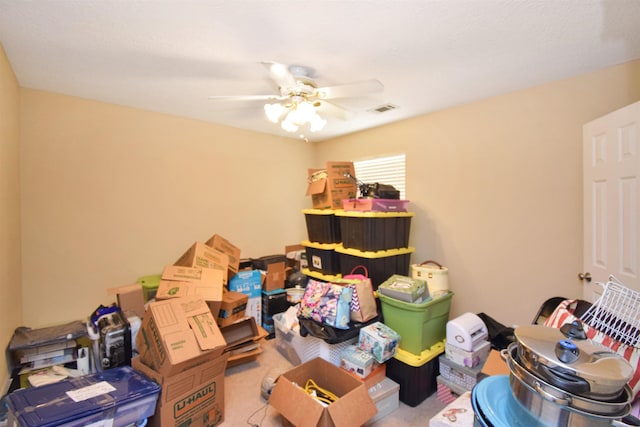 storage area featuring ceiling fan