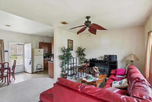 living room with ceiling fan