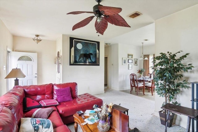 living room featuring ceiling fan